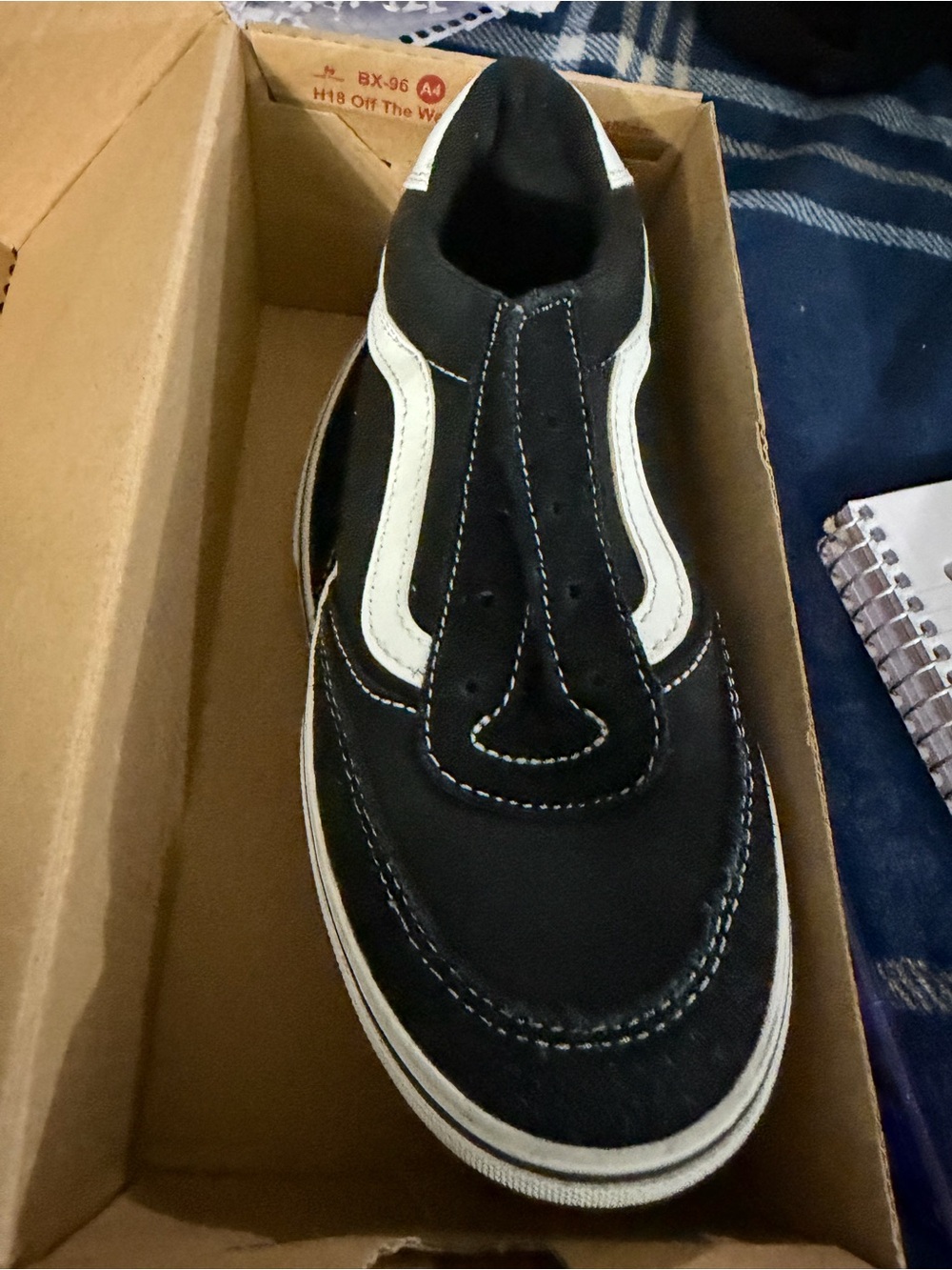 Vans Black Canvas Slip-On with White Side Stripe